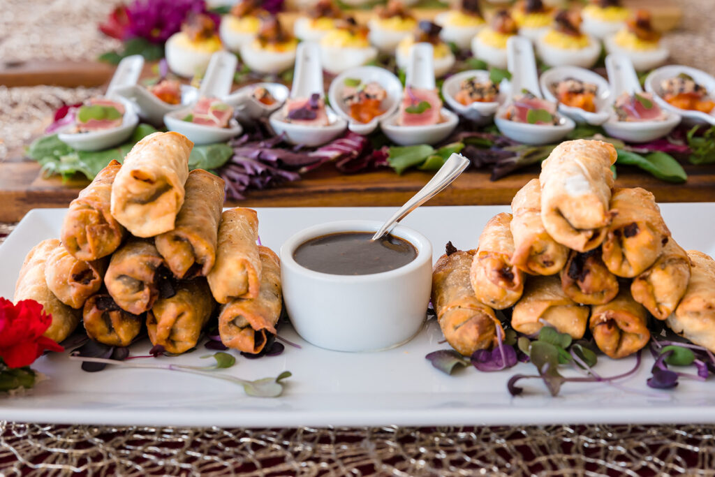 Appetizers featuring egg rolls and sushi at Grand View Mendon MA